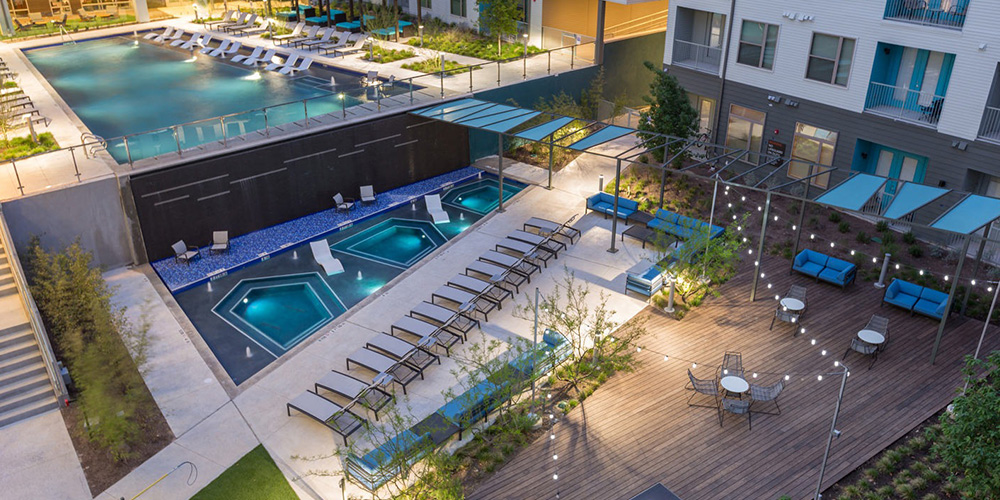 bird-eye's view of an apartment pool with three pools